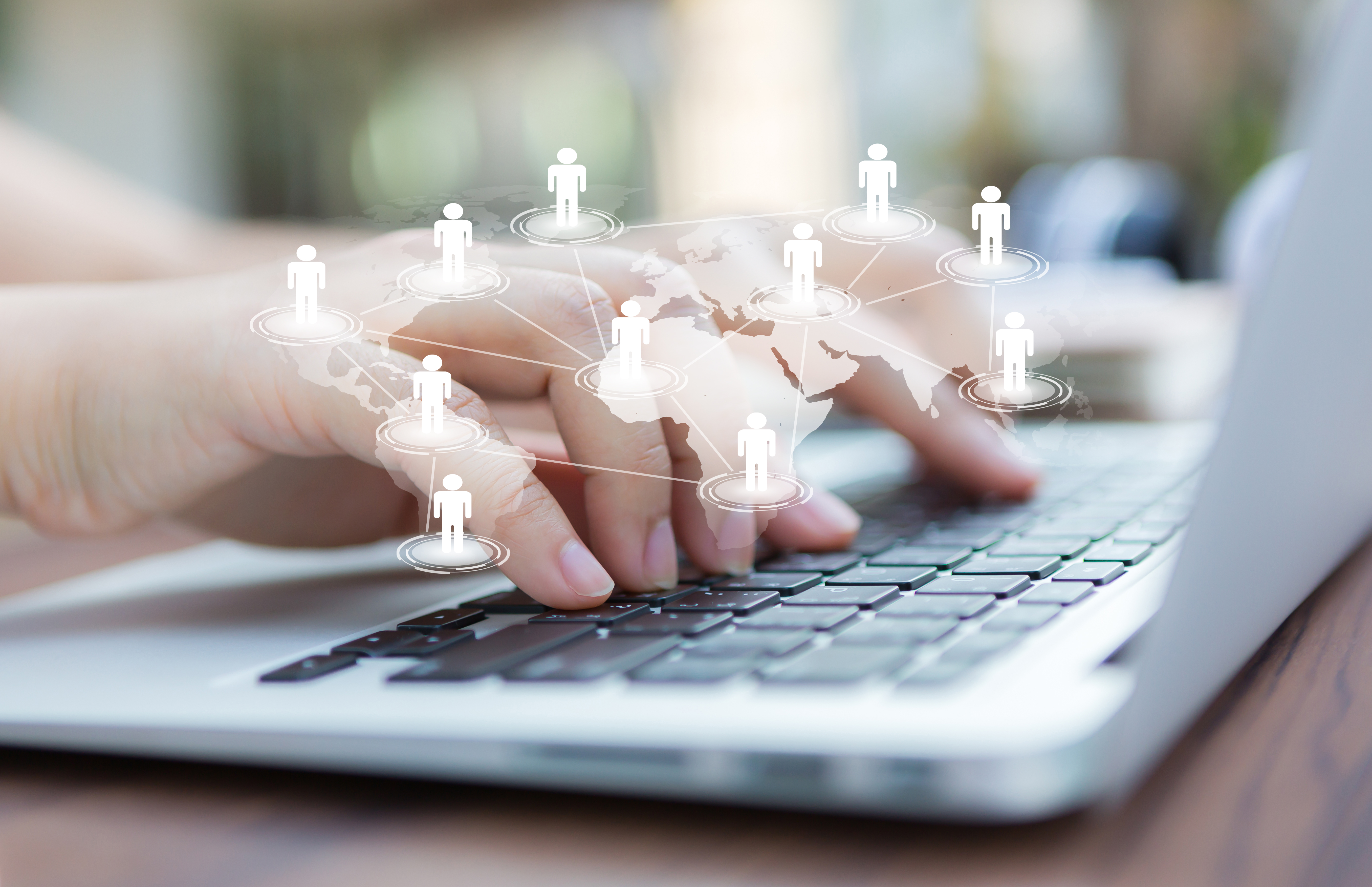 hands-with-laptop-virtual-world-map.jpg